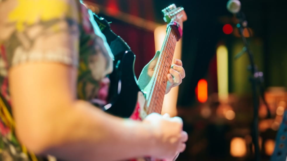 Person playing guitar-2